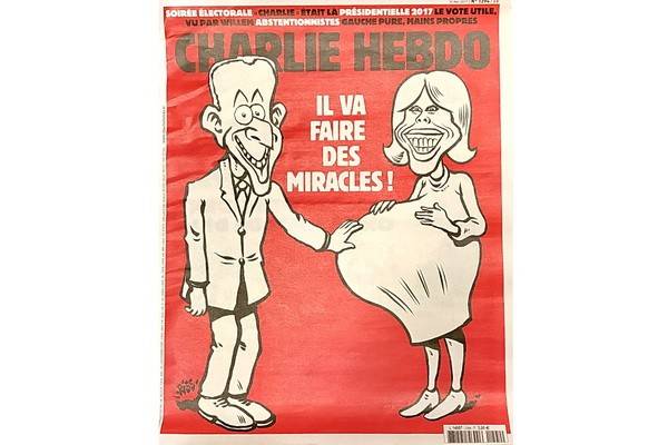 Журнал Charlie Hebdo опубликовал злую карикатуру на нового президента Франции и его жену