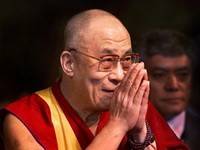 Далай-лама прокомментировал супружеские измены Тайгера Вудса